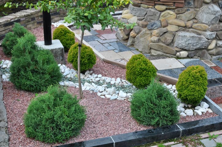 Decorative rocks and shrubs create an attractive, low-maintenance landscape in Ogden, UT