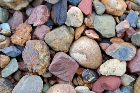 Various landscape rock sizes and colors are displayed for outdoor projects in Ogden, UT